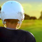 Concussions - person wearing NFL helmet during daytime