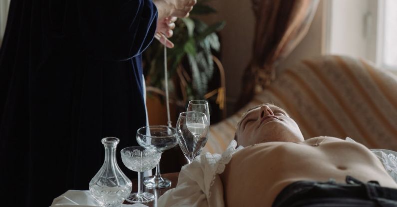 Exorcisms - Woman in Black Dress Lying on Bed